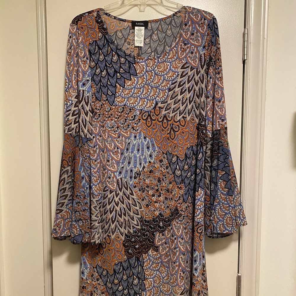 Cute BOHO style bell sleeve dress. Perfect for spring!
